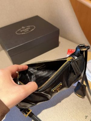Prada women's Re-Edition 2002 waxed leather baguette underarm bag - Image 3
